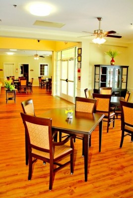Table with three chairs and space for wheelchair