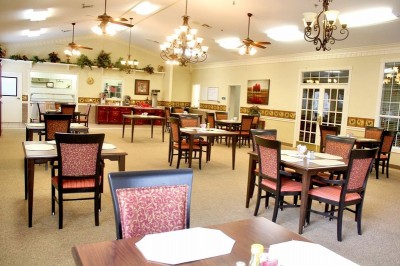 Dining area with tables, chairs and hanging lights