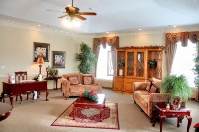 Common area with couches, a rug and tables