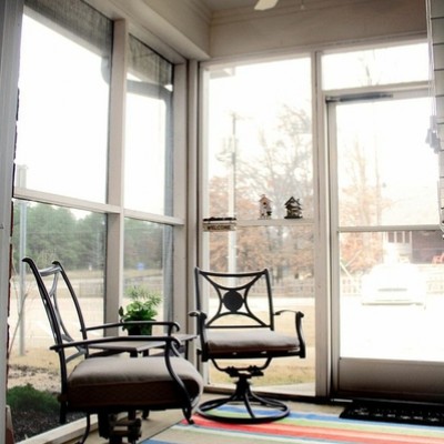 Indoor sun room with two chairs